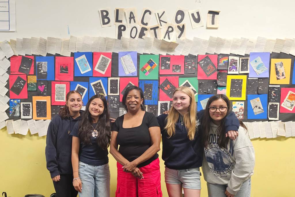 Ms. De'Andrea Bell, ELA Teacher, and students at Thorp ES